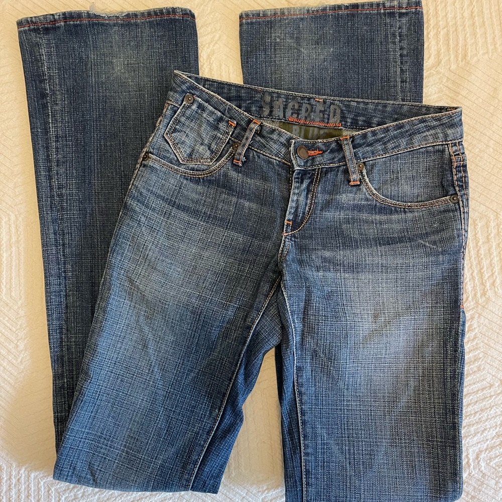 Women’s Sacred Blue low rise bootcut jeans with leather trim